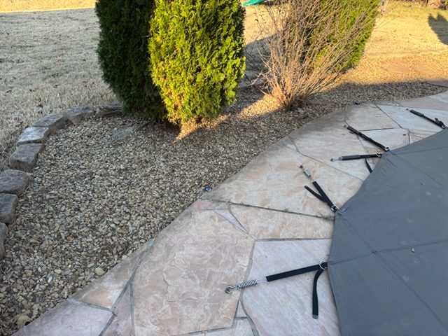 Clean gravel poolside bed after