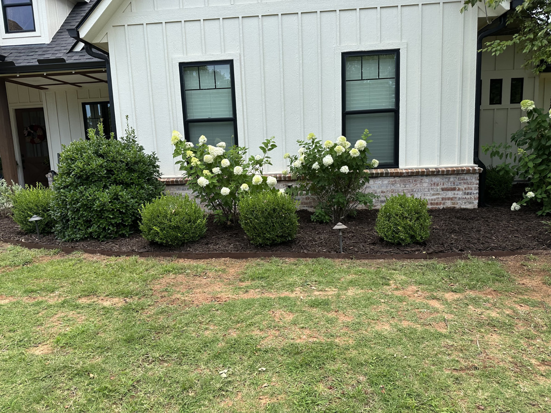Farmhouse front flower beds in the OKC metro